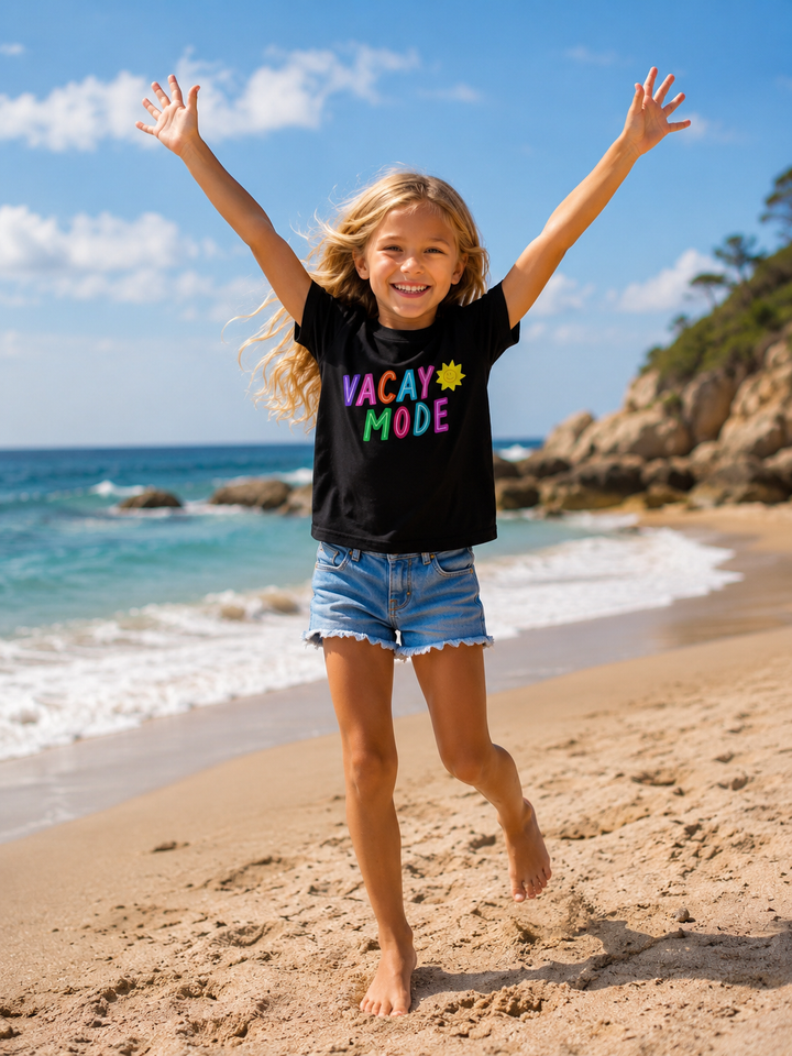 kids black vacay mode graphic vacation t-shirt by Leisurist with umbrella logo on sleeve