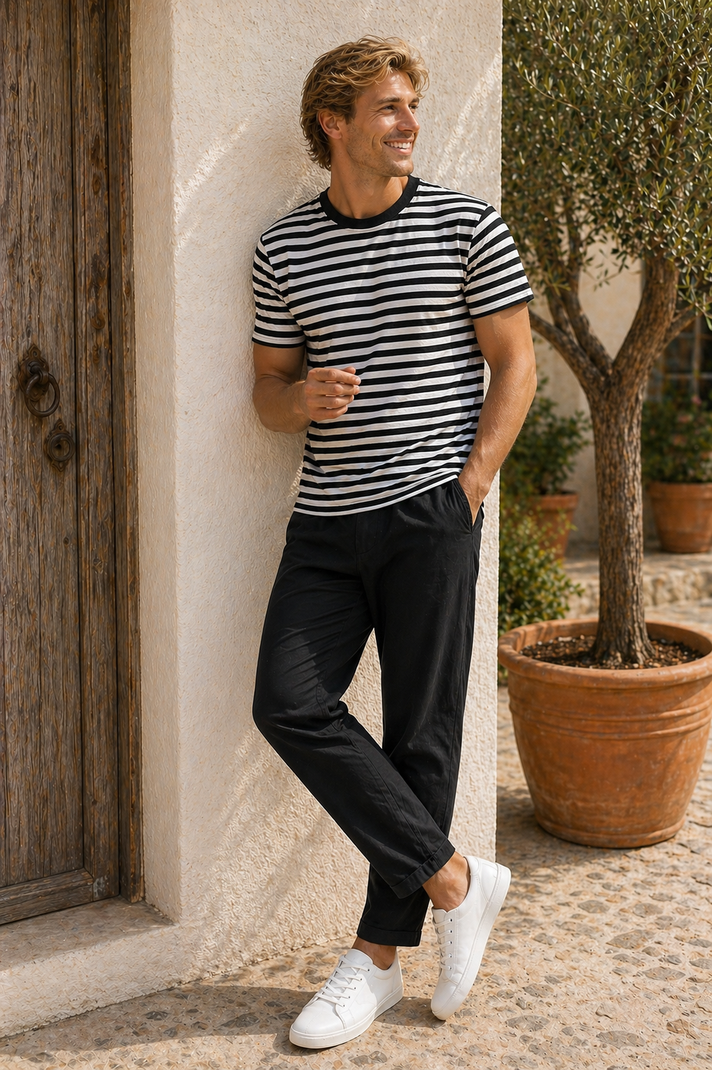 Men's black and white striped Riviera graphic t-shirt by Leisurist with umbrella logo on sleeve